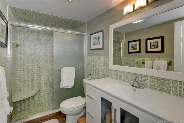 a bathroom with a sink and a toilet