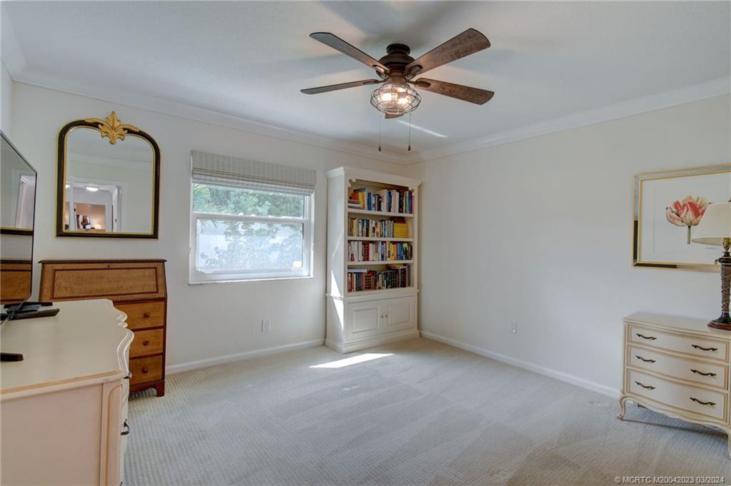 5 Banyan Road Stuart, FL 34996 - Photo 27 of 49 an empty room with windows and cabinet