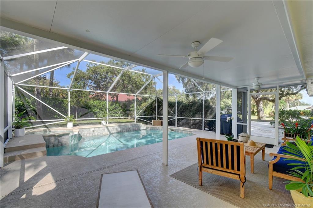 5 Banyan Road Stuart, FL 34996 - Photo 37 of 49 a garden view with a sitting space