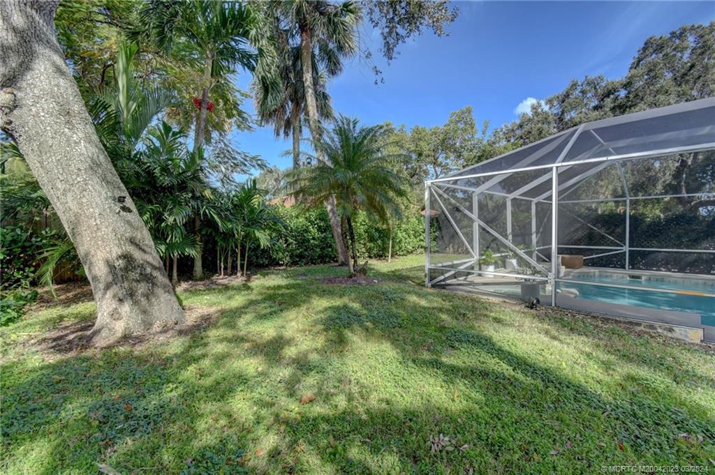 5 Banyan Road Stuart, FL 34996 - Photo 38 of 49 a view of a yard with a slide