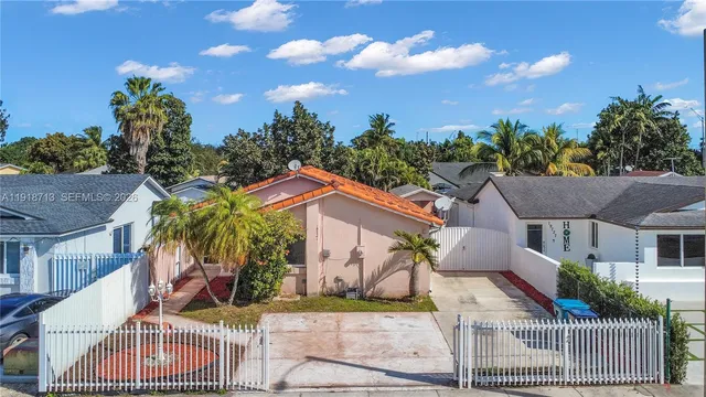 front view of house with a garden