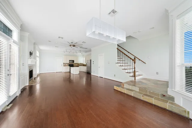 a view of a livingroom with wooden floor
