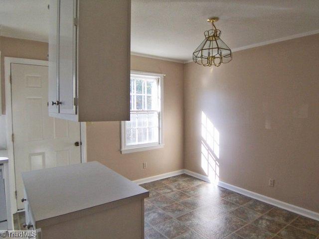 1007 Robin Hood Road, Unit B High Point, NC 27262 - Photo 3 of 10 Dining Room. Breakfast/Dining area. Nice flooring.