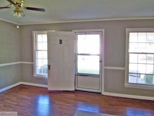 1007 Robin Hood Road, Unit B High Point, NC 27262 - Photo 4 of 10 Other. Living room with wood floors. Nice new paint.