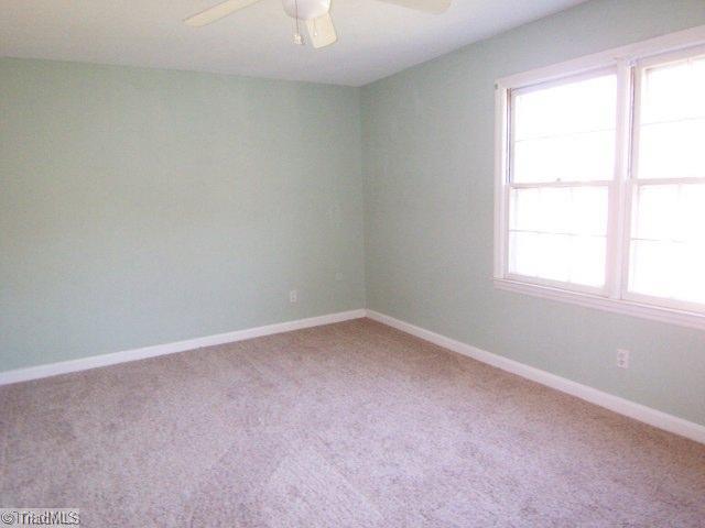 1007 Robin Hood Road, Unit B High Point, NC 27262 - Photo 5 of 10 1st Bedroom. All new carpet. Nice pastel bedroom.