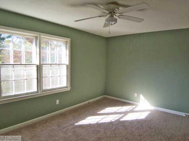 1007 Robin Hood Road, Unit B High Point, NC 27262 - Photo 6 of 10 1st Bedroom. Large sunny bedroom with new carpet and pretty paint.