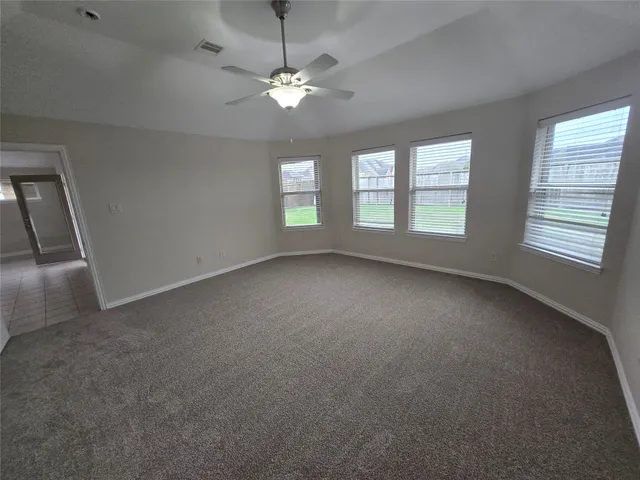 a bathroom with a sink vanity and mirror