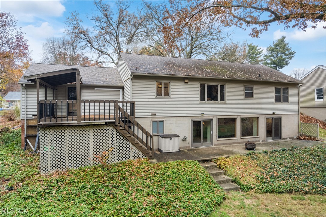 234 Reed Road Wooster, OH 44691 - Photo 33 of 36 Rear view of property with stairs, a shingled roof, a patio, and a deck