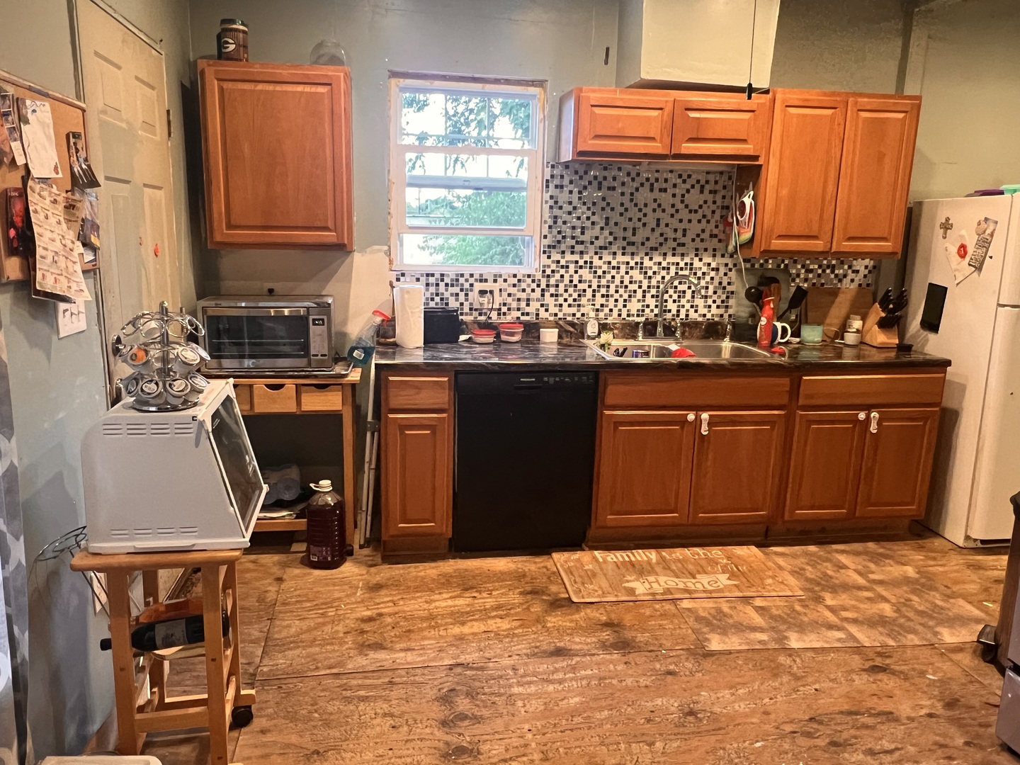 549 Congdon Avenue Elgin, IL 60120 - Photo 11 of 15 a kitchen with stainless steel appliances granite countertop a sink stove and refrigerator