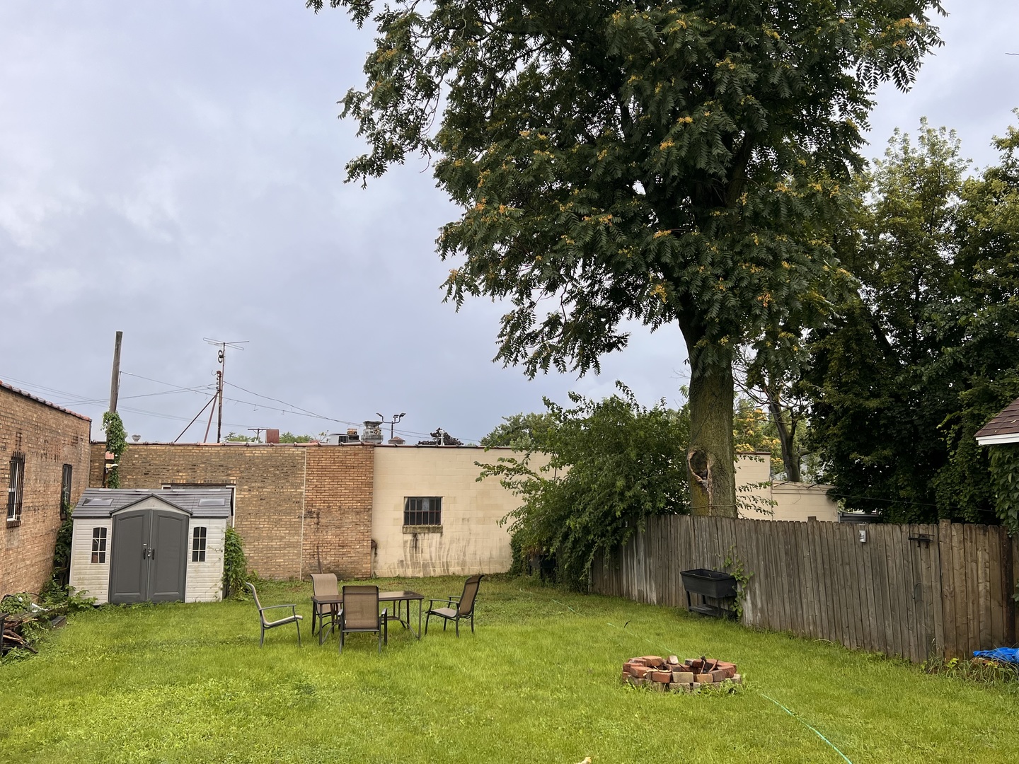 549 Congdon Avenue Elgin, IL 60120 - Photo 4 of 15 a view of a chairs and table on the wooden deck