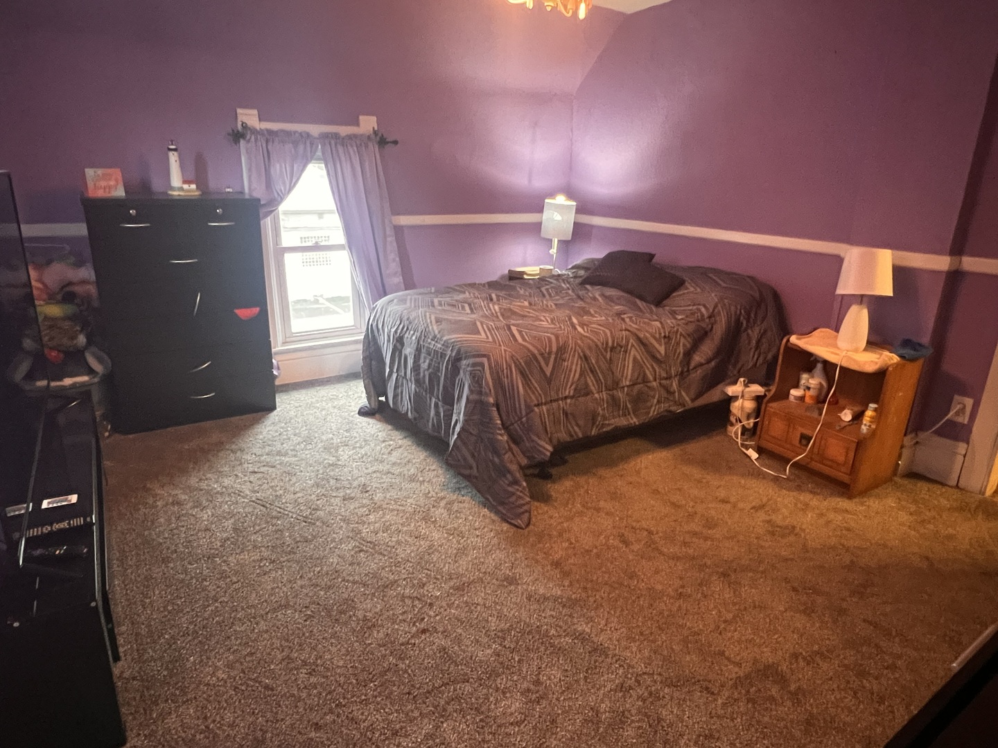 549 Congdon Avenue Elgin, IL 60120 - Photo 7 of 15 a spacious bedroom with a bed and a lamp