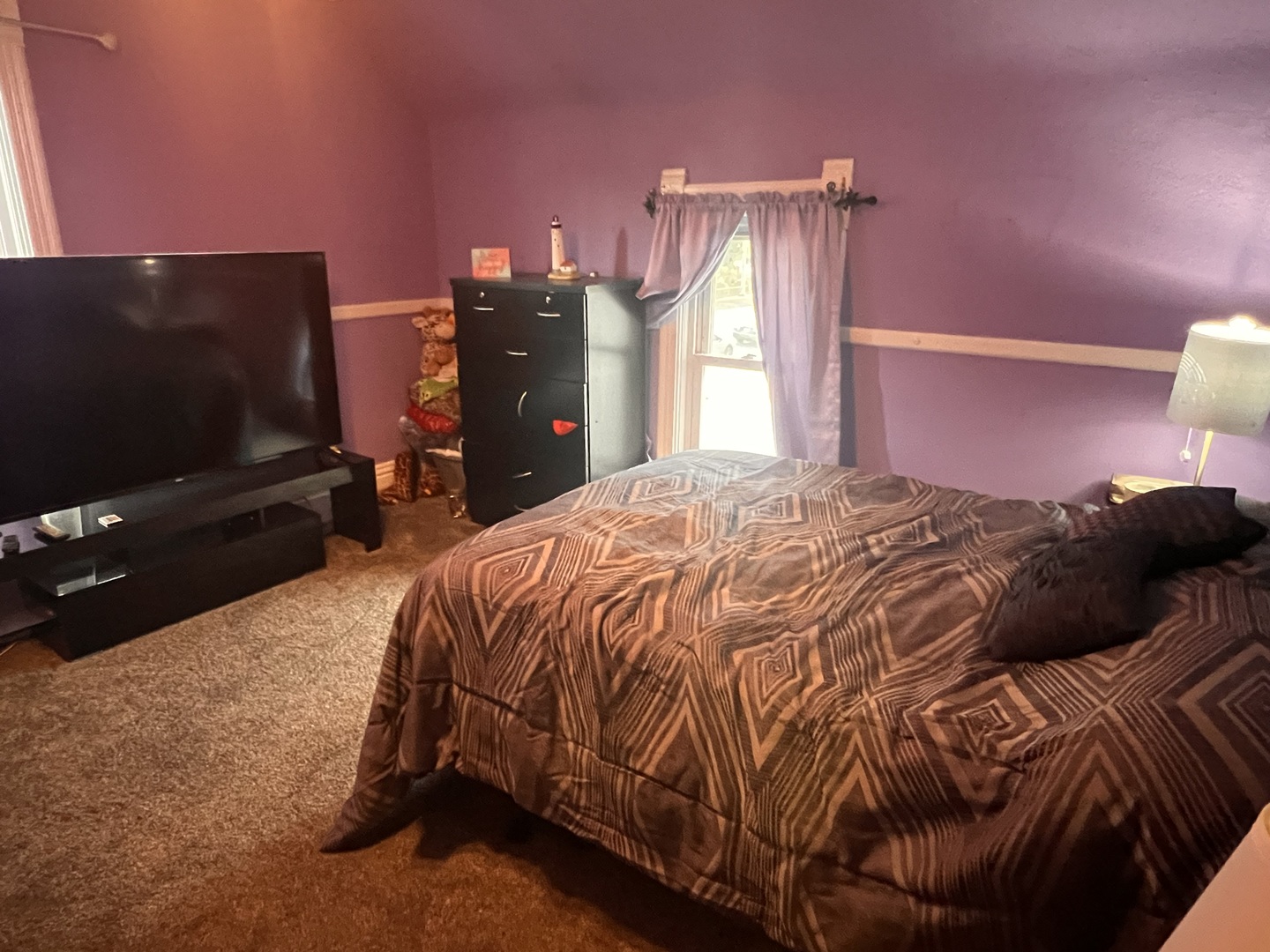 549 Congdon Avenue Elgin, IL 60120 - Photo 8 of 15 a bed sitting in a bedroom and flat screen tv