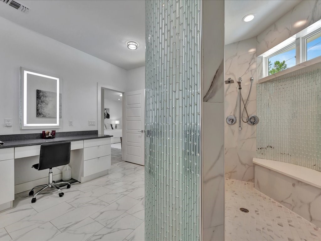 129 White Oak Loop Lufkin, TX 75901 - Photo 17 of 50 a bathroom with a granite countertop sink a toilet and shower
