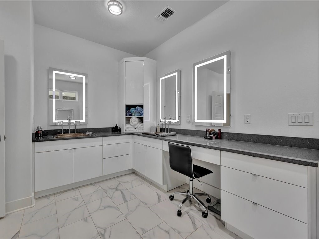 129 White Oak Loop Lufkin, TX 75901 - Photo 19 of 50 a kitchen with sink cabinets and window
