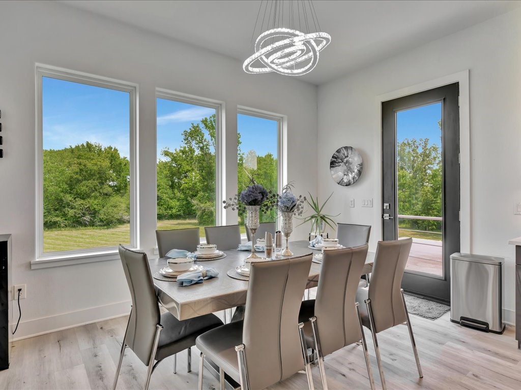 129 White Oak Loop Lufkin, TX 75901 - Photo 34 of 50 a view of a dining room with furniture window and outside view