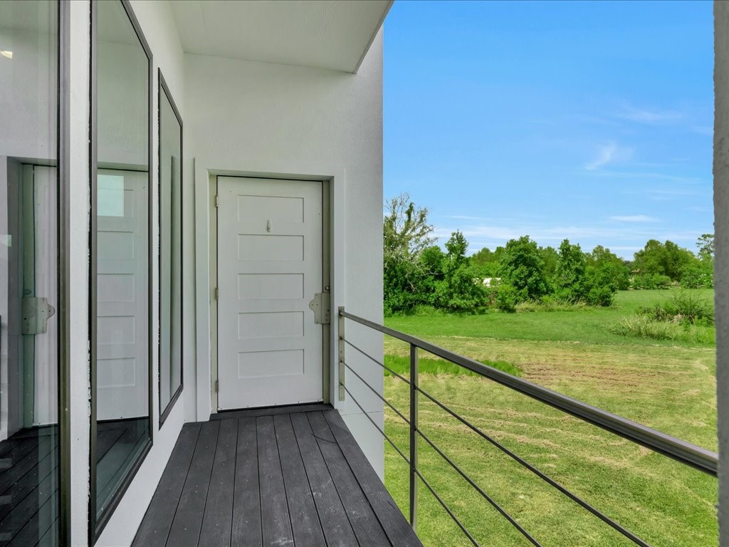 129 White Oak Loop Lufkin, TX 75901 - Photo 35 of 50 a view of balcony with yard and outdoor seating