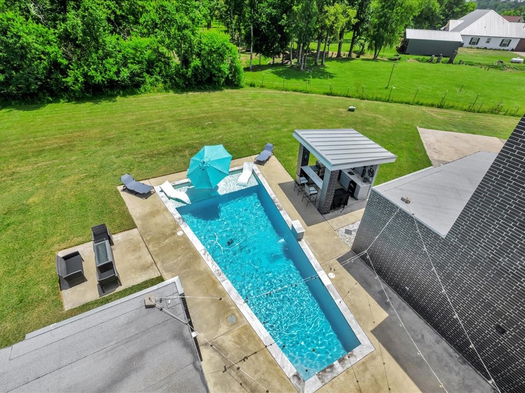 129 White Oak Loop Lufkin, TX 75901 - Photo 45 of 50 an aerial view of a house with garden space and deck