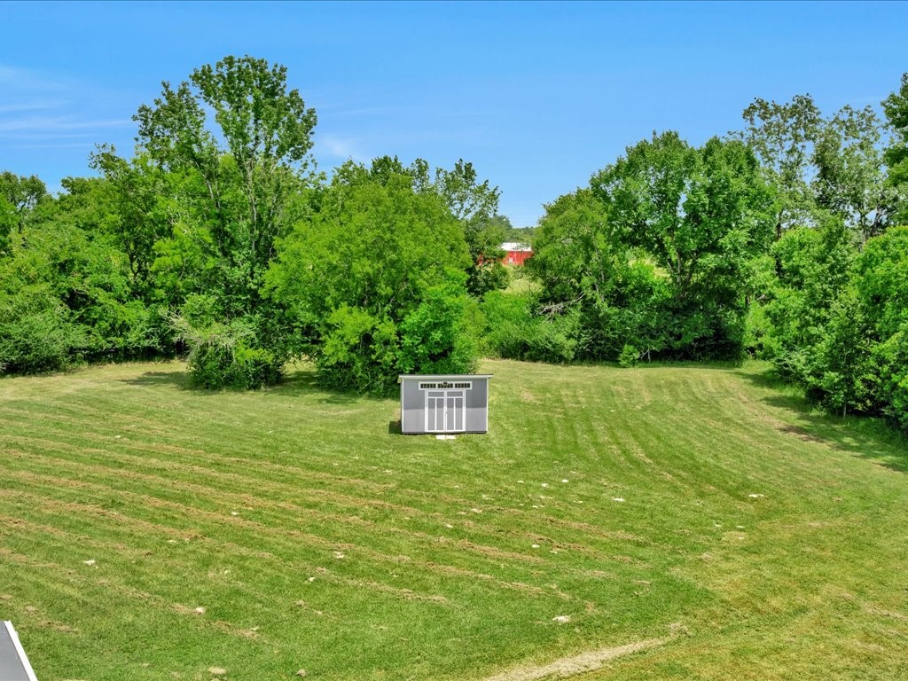 129 White Oak Loop Lufkin, TX 75901 - Photo 48 of 50 a view of a field with trees