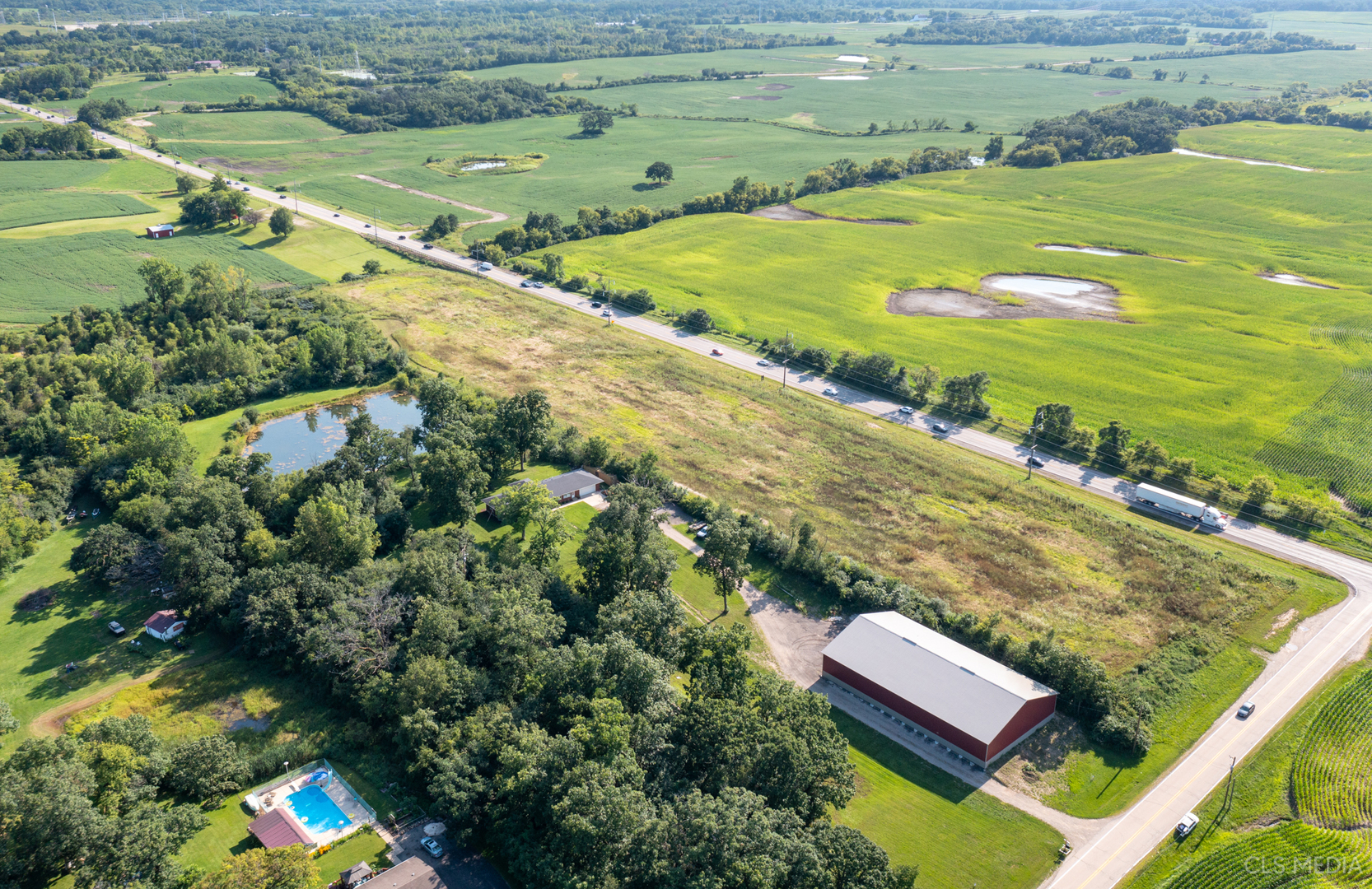 0 Rt 47 & Hercules Rd Highway Woodstock, IL 60098 - Photo 6 of 12 a view of an ocean from a balcony