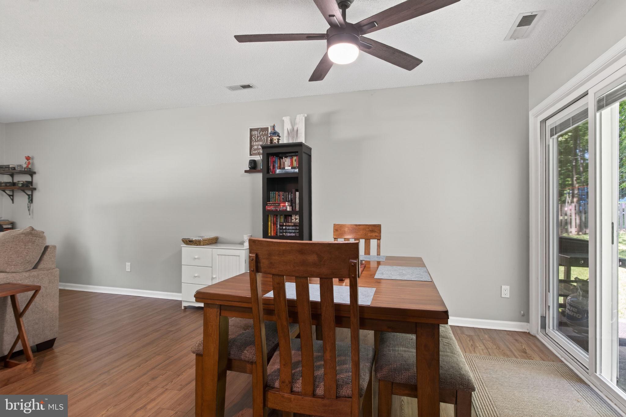 3917 Longhill Station Road Williamsburg, VA 23188 - Photo 10 of 29 Bright and inviting dining space.