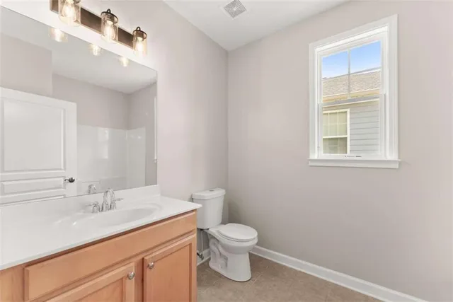 a bathroom with a bathtub and a window