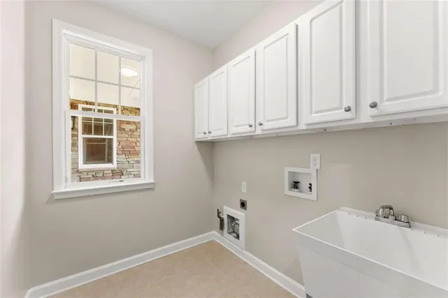 an aerial view of residential house with outdoor space and swimming pool