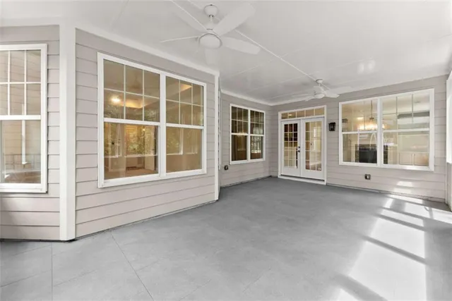 an aerial view of a house with swimming pool and garden
