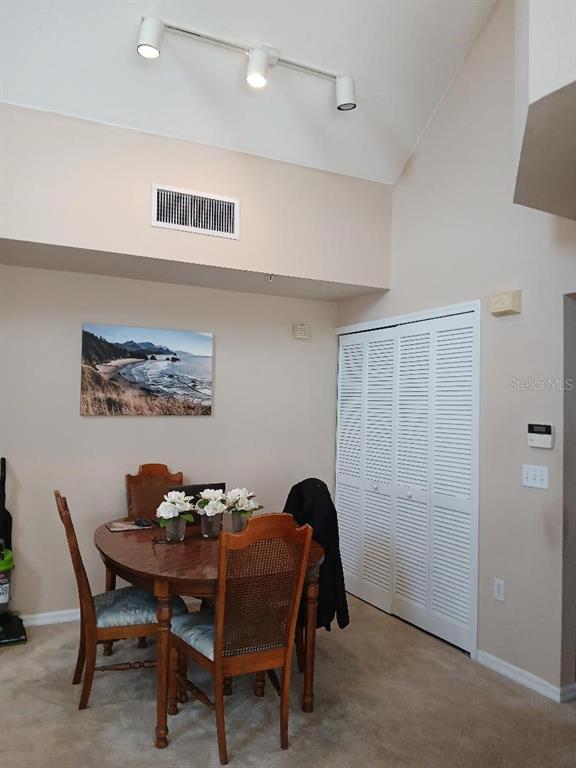 5581 Rosehill Road, Unit 203 Sarasota, FL 34233 - Photo 9 of 17 a view of a dining room with furniture