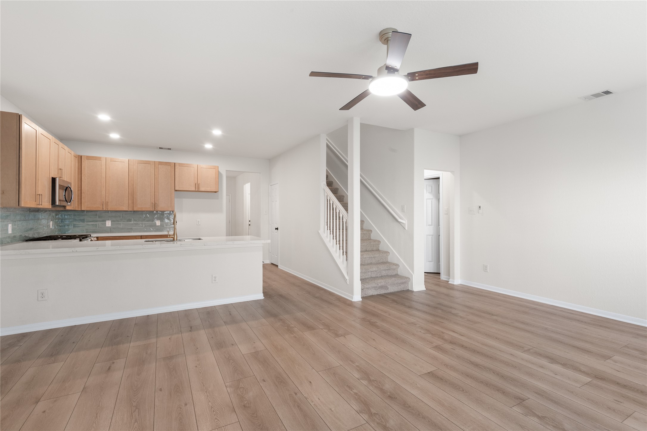 714 Northridge Terrace Lane Spring, TX 77373 - Photo 12 of 42 Living room looking toward half bath on the right.