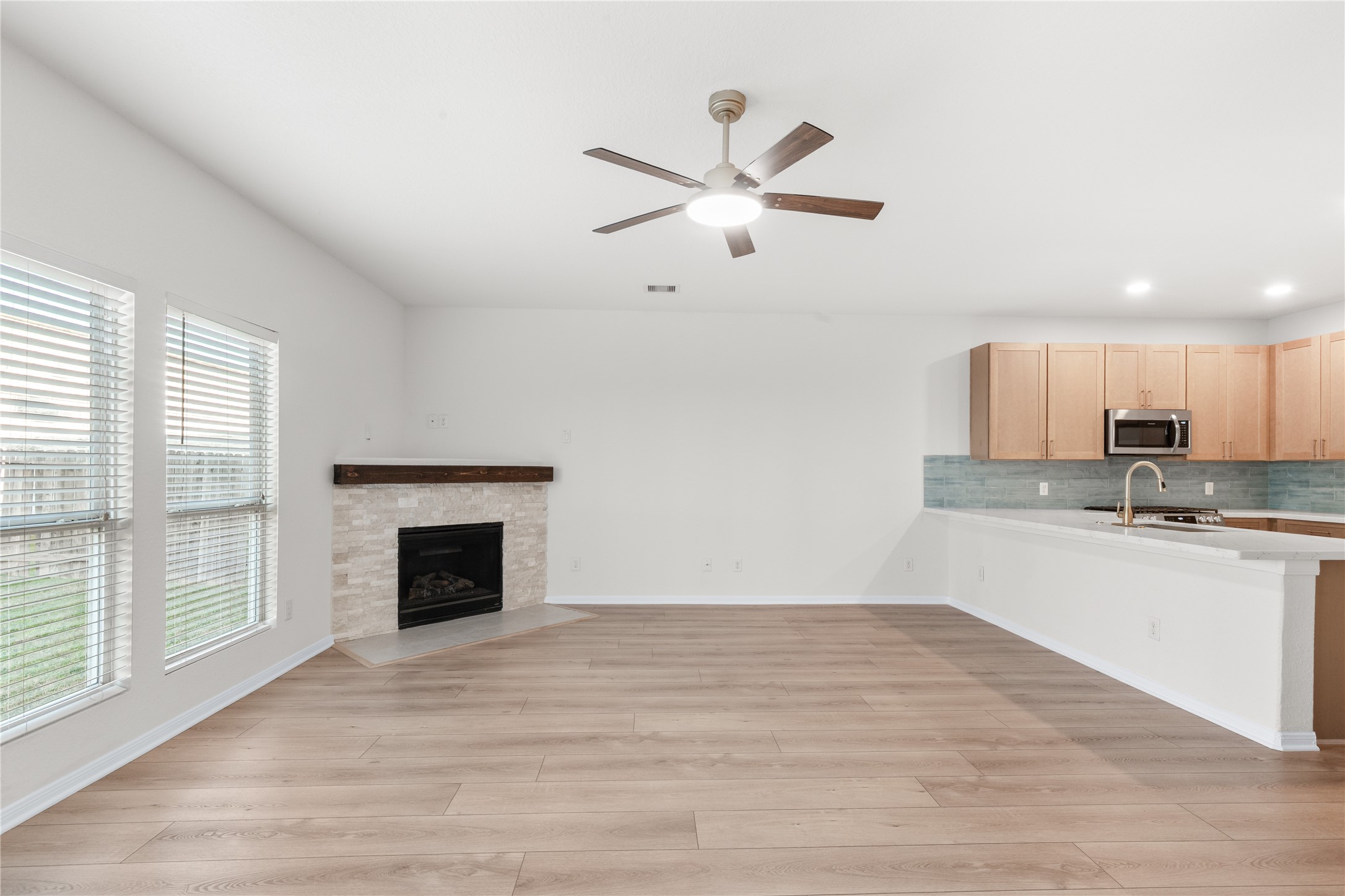 714 Northridge Terrace Lane Spring, TX 77373 - Photo 9 of 42 Living room with a breakfast bar just off the kitchen!