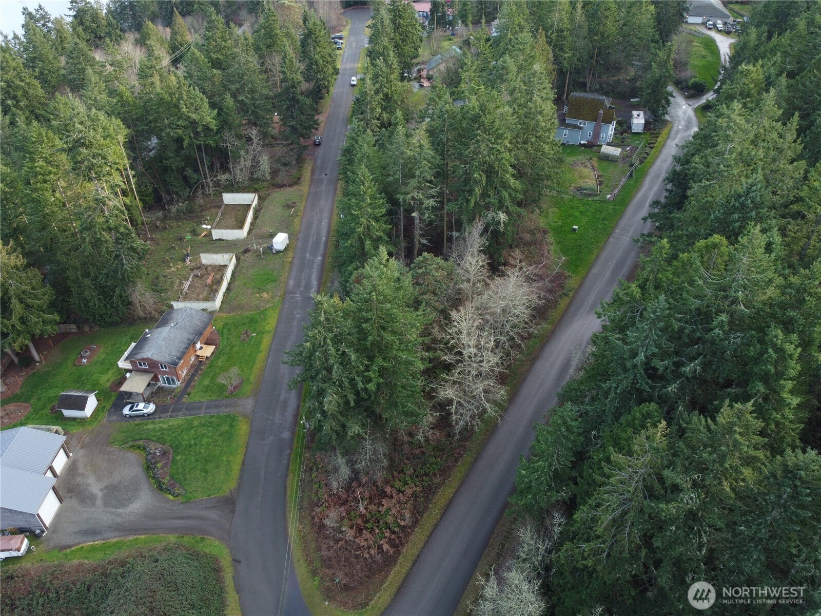 0 Lylus Lane Port Hadlock, WA 98339 - Photo 7 of 13 an aerial view of residential houses with outdoor space and trees