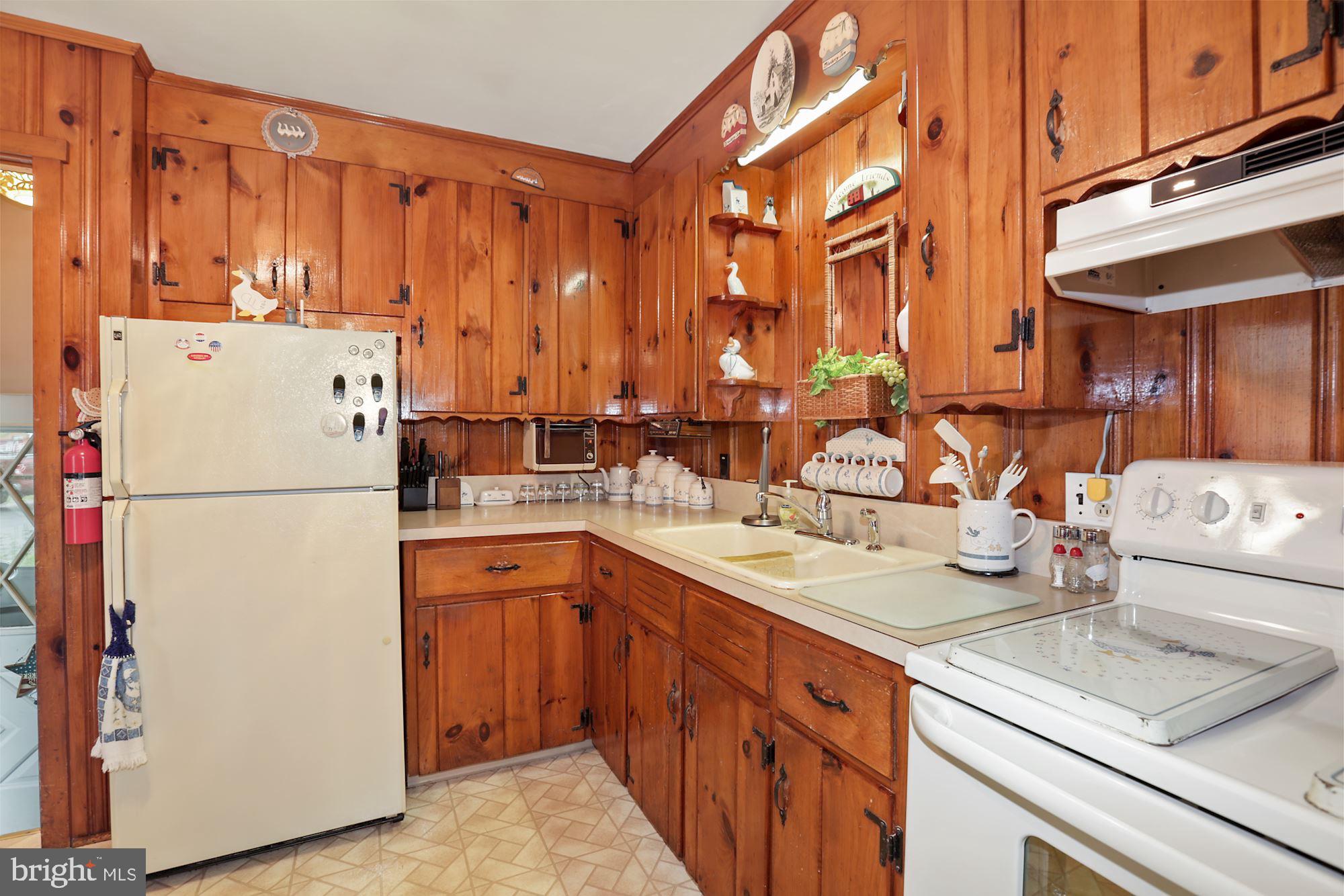 161 Carranza Road Tabernacle, NJ 08088 - Photo 7 of 22 a kitchen with refrigerator and cabinets