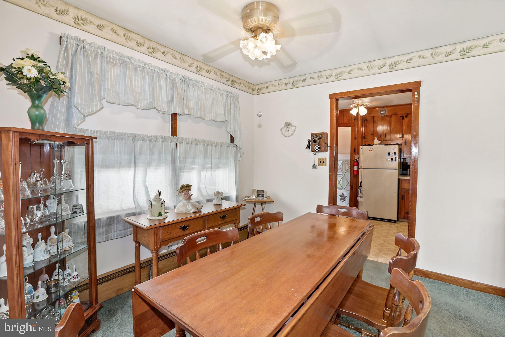 161 Carranza Road Tabernacle, NJ 08088 - Photo 10 of 22 a room with chandelier fan and wooden floor