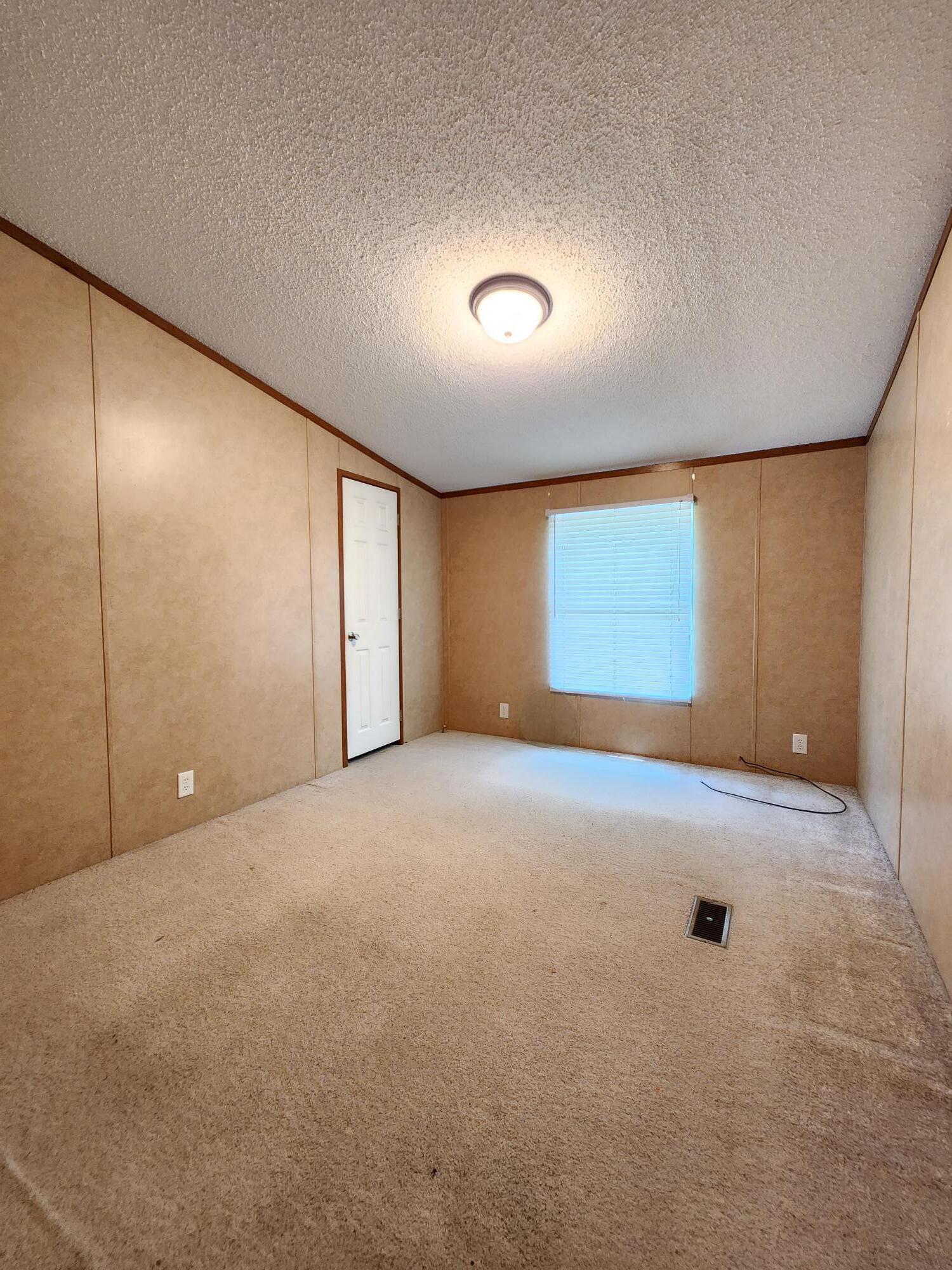5399 Fox Hound Lane Baker, FL 32531 - Photo 13 of 15 a view of an empty room