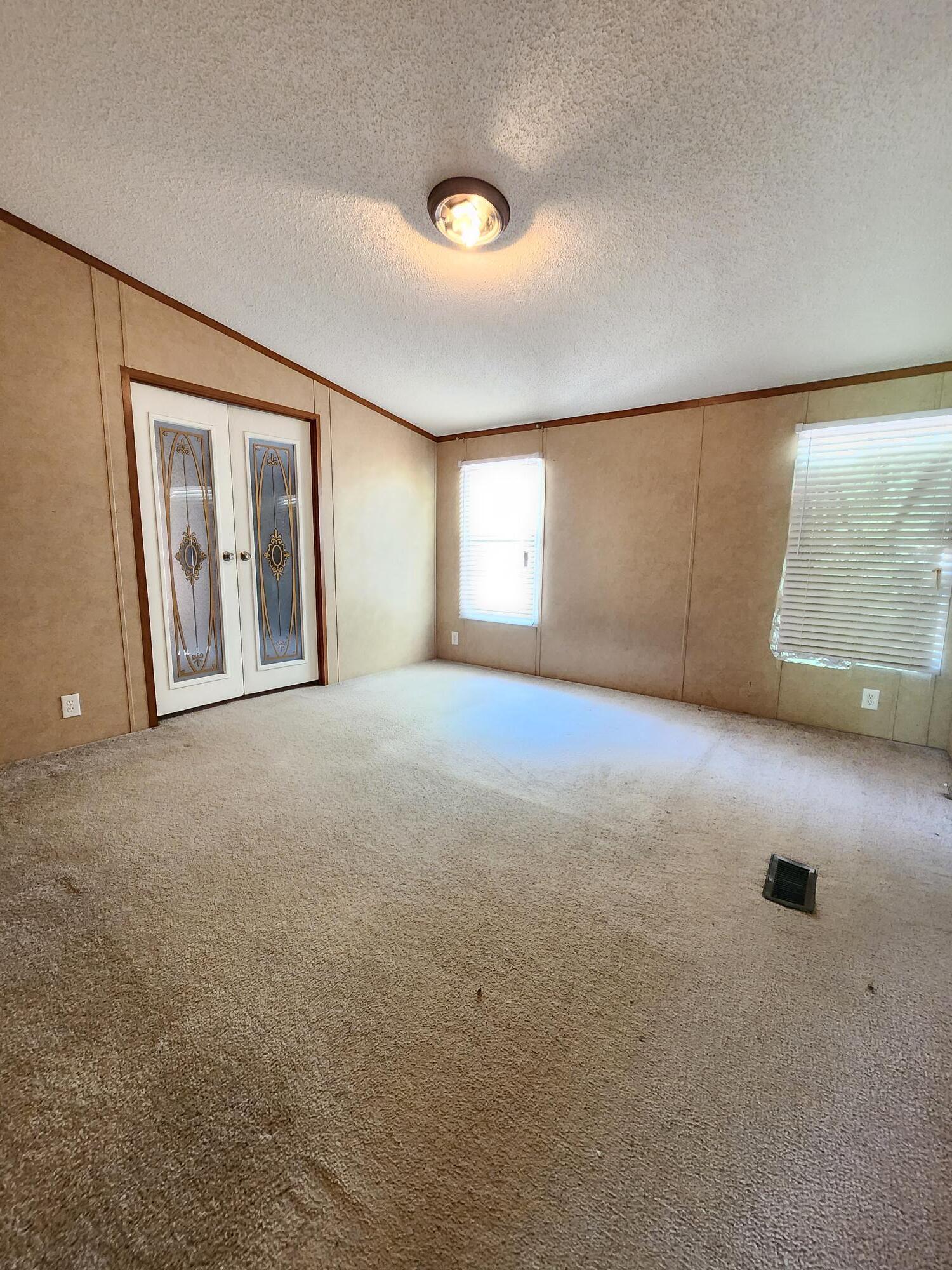 5399 Fox Hound Lane Baker, FL 32531 - Photo 9 of 15 a view of an empty room with a window