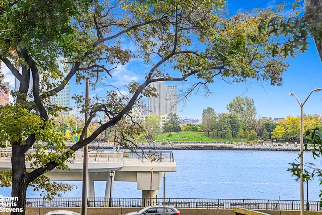 a view of a building with a tree