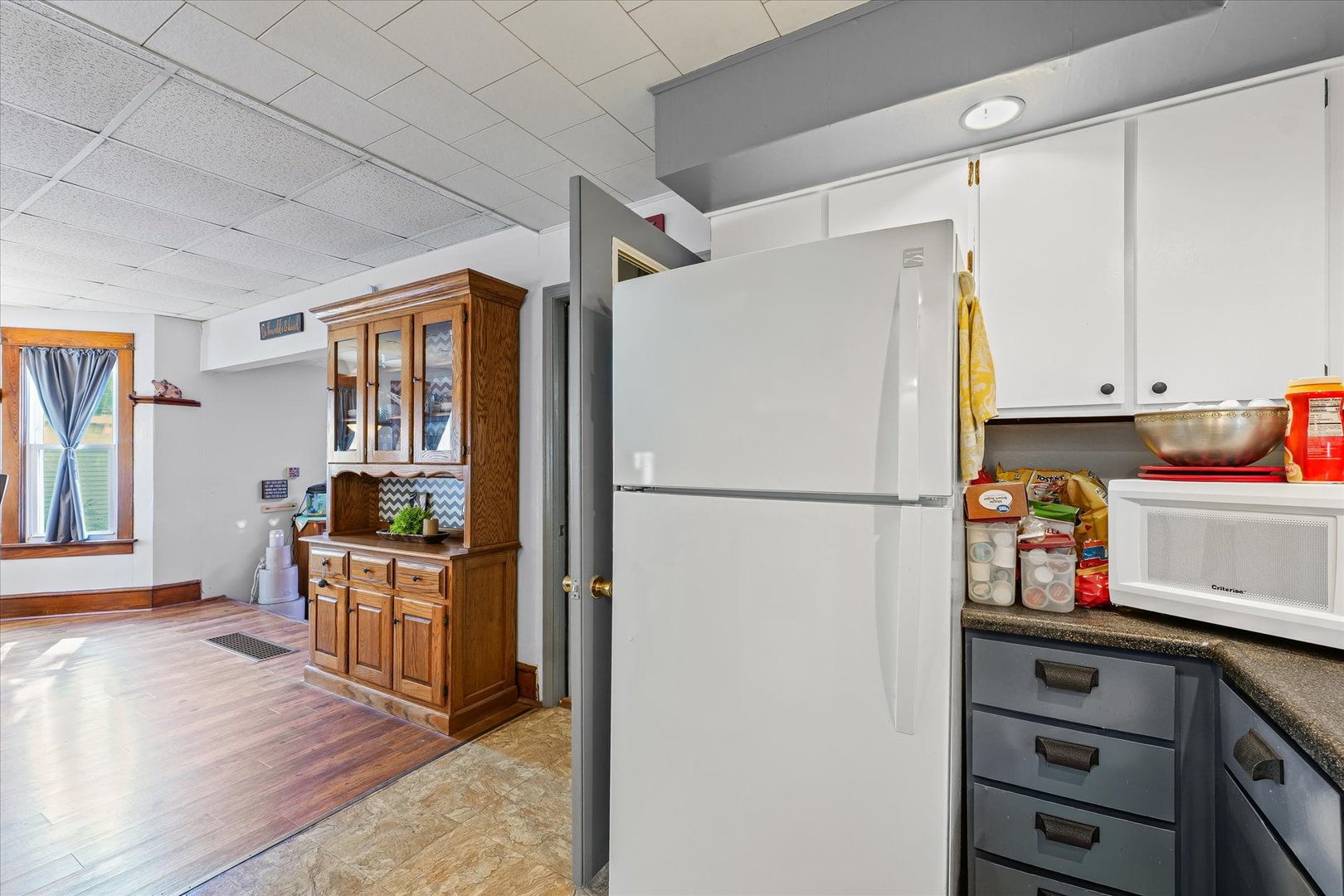 217 North Main Street Roberts, IL 60962 - Photo 16 of 36 a kitchen with stainless steel appliances a refrigerator sink and cabinets