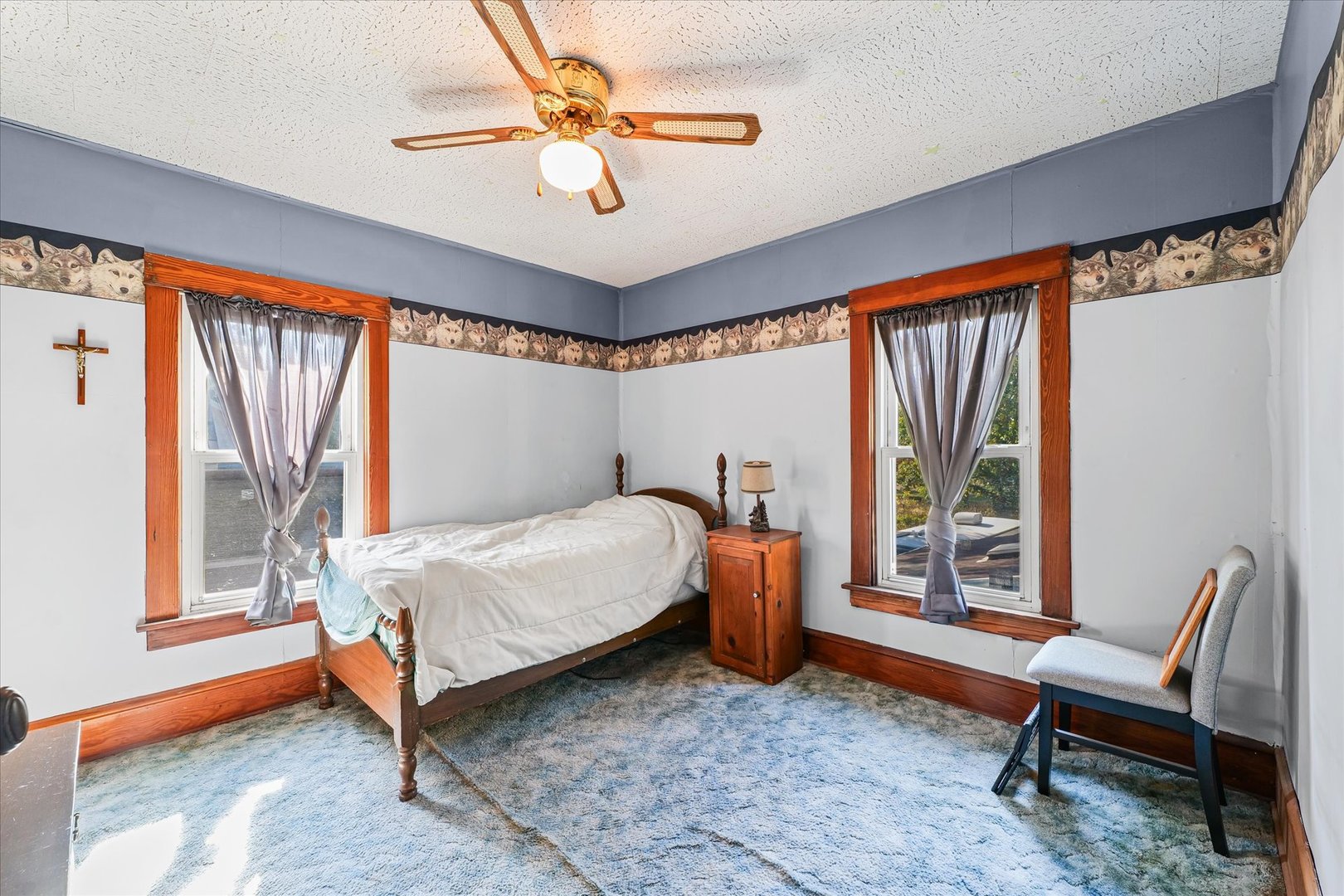 217 North Main Street Roberts, IL 60962 - Photo 23 of 36 a bedroom with a bed and a window