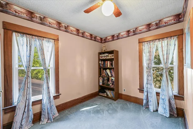 an empty room with windows