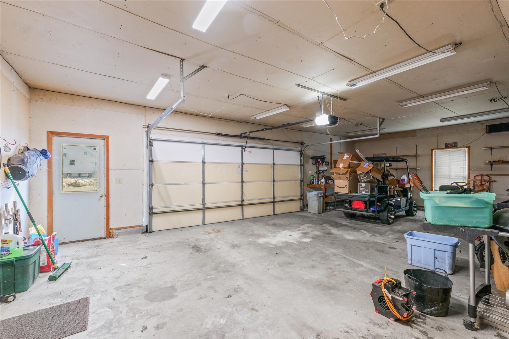 217 North Main Street Roberts, IL 60962 - Photo 29 of 36 a view of a garage with parked cars