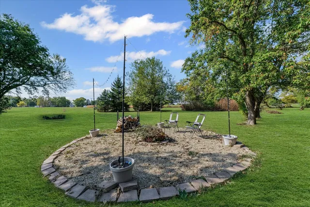 a view of a garden with a fountain