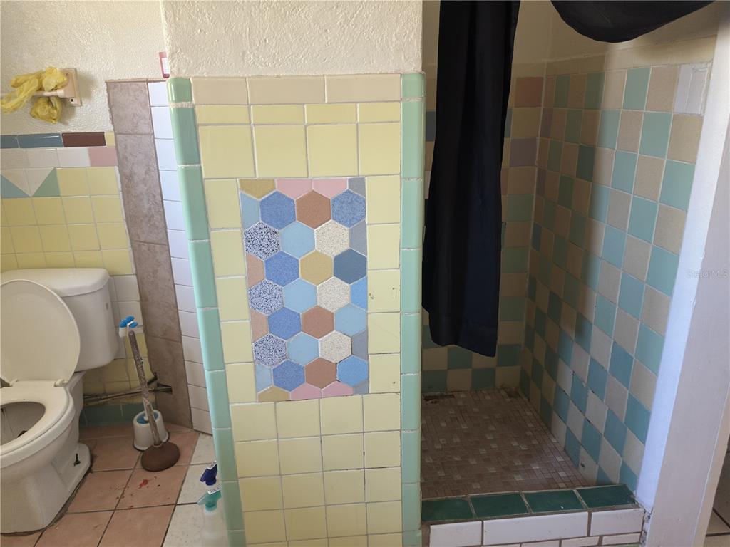 7211 James Street Port Richey, FL 34668 - Photo 12 of 14 a bathroom with a sink and toilet