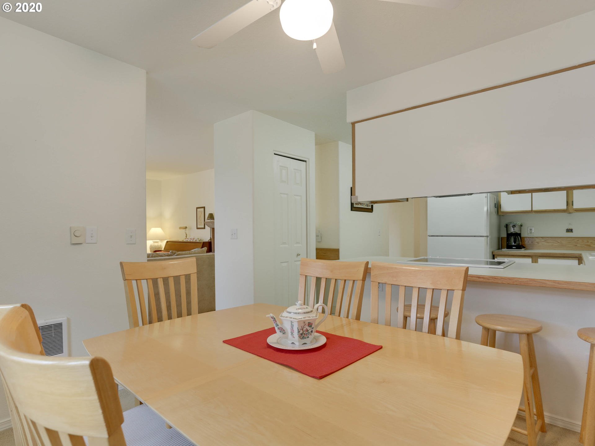 4614 West Powell Boulevard, Unit 261 Gresham, OR 97030 - Photo 11 of 29 a bedroom with furniture and a wooden floor