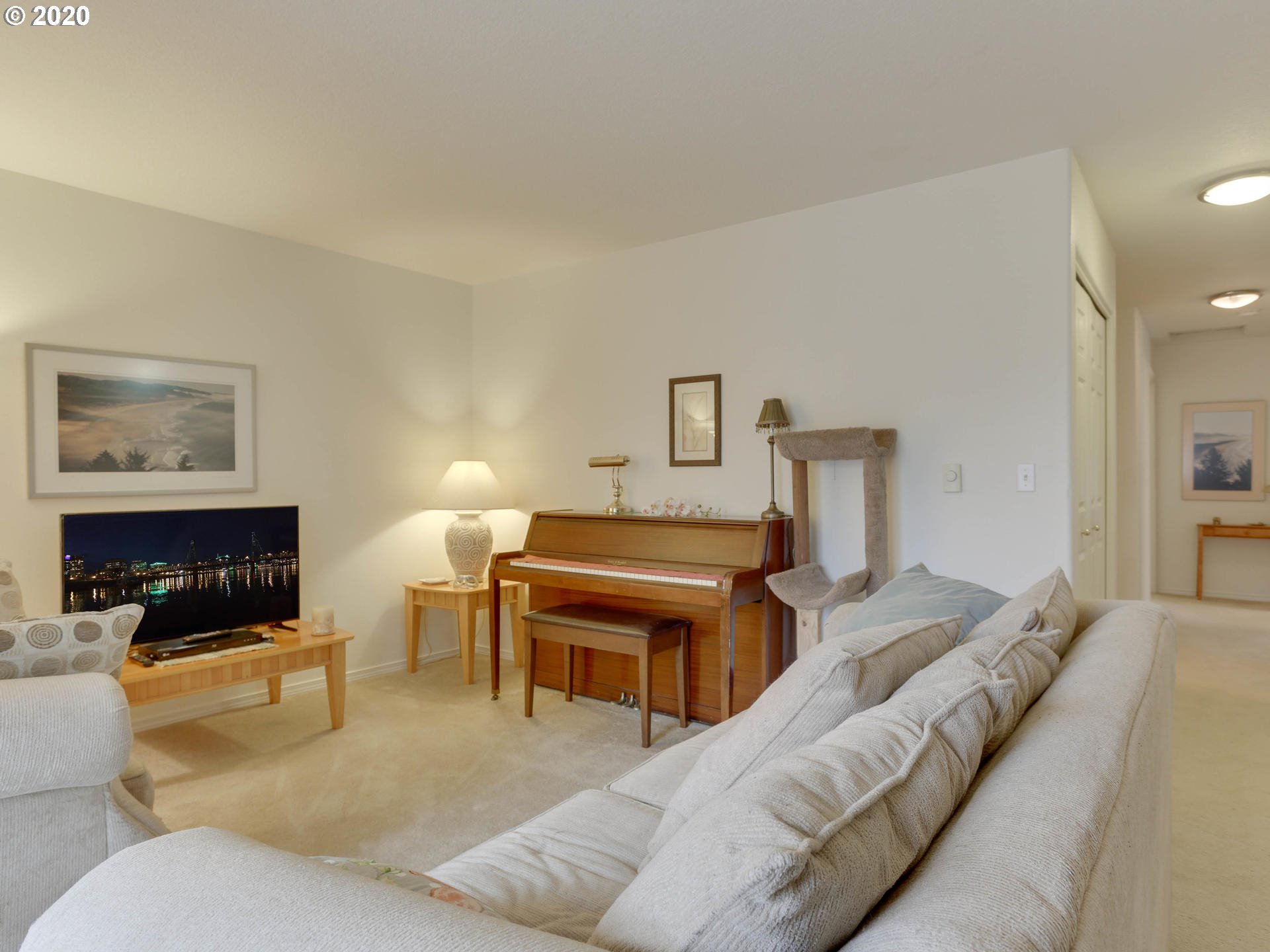 4614 West Powell Boulevard, Unit 261 Gresham, OR 97030 - Photo 8 of 29 a living room with furniture a couch and a fireplace