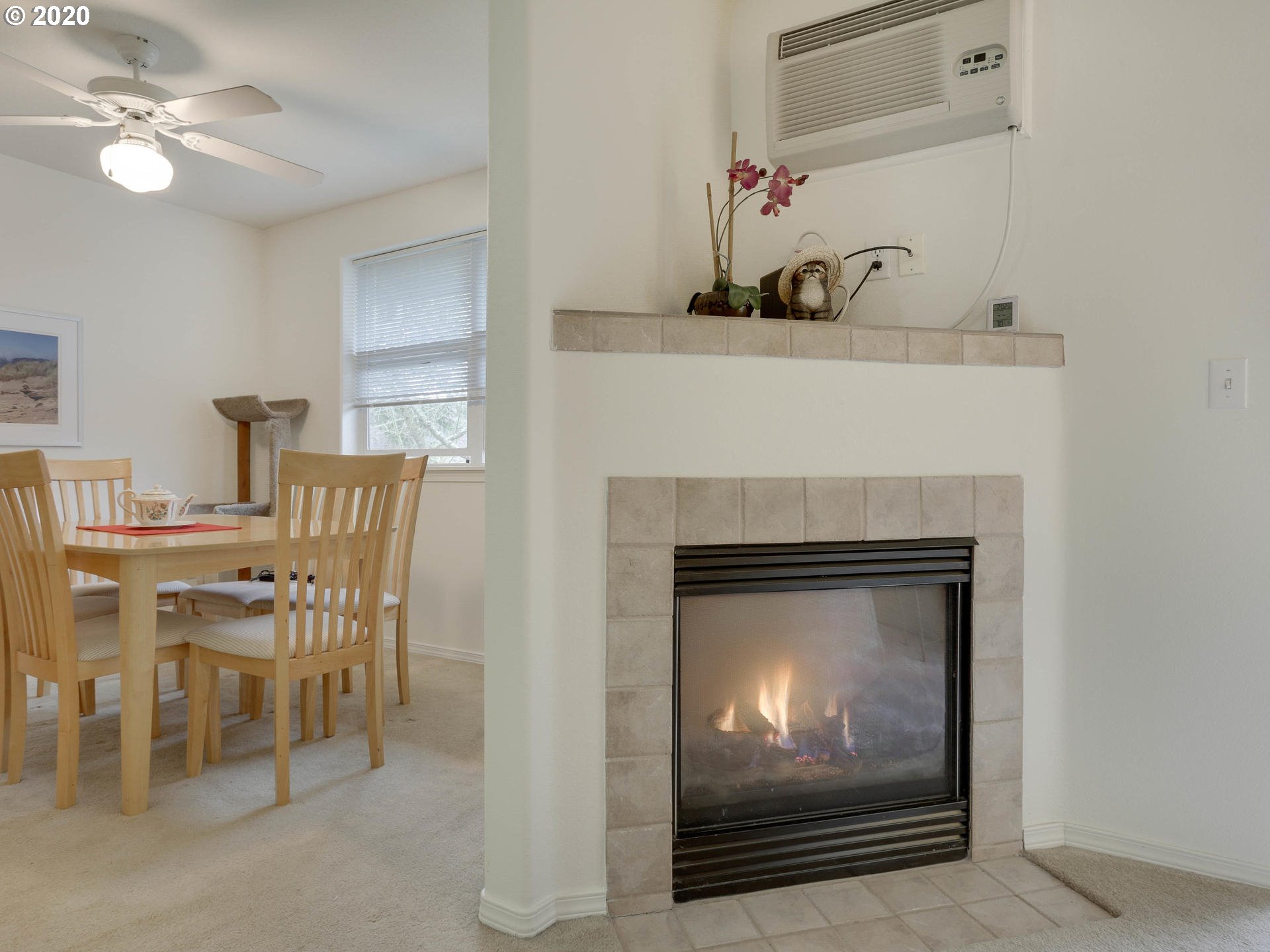 4614 West Powell Boulevard, Unit 261 Gresham, OR 97030 - Photo 9 of 29 a view of a livingroom with furniture and a fireplace