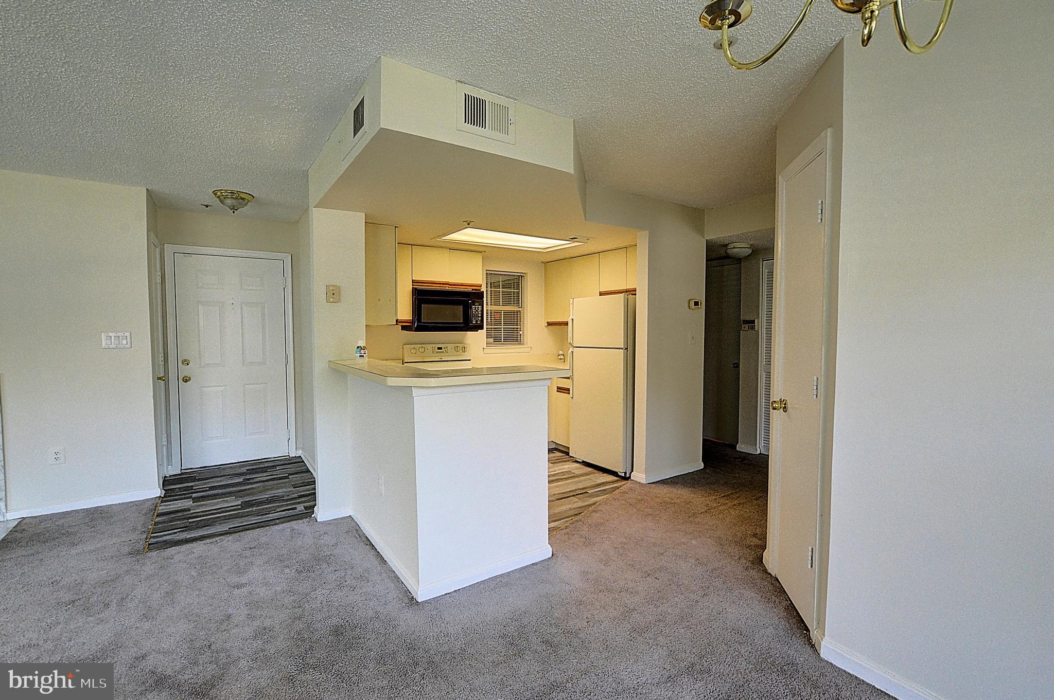 10401 Beacon Ridge Drive, Unit 101 Bowie, MD 20721 - Photo 5 of 14 Foyer/Kitchen