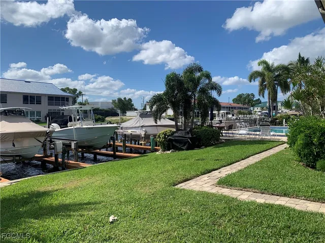 a view of a park with of swings and slides