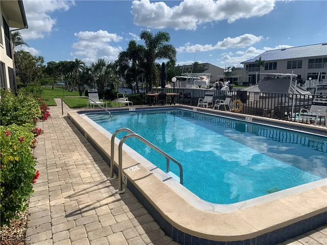 a view of a swimming pool with a garden