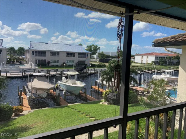 a view of a lake from a building from a window