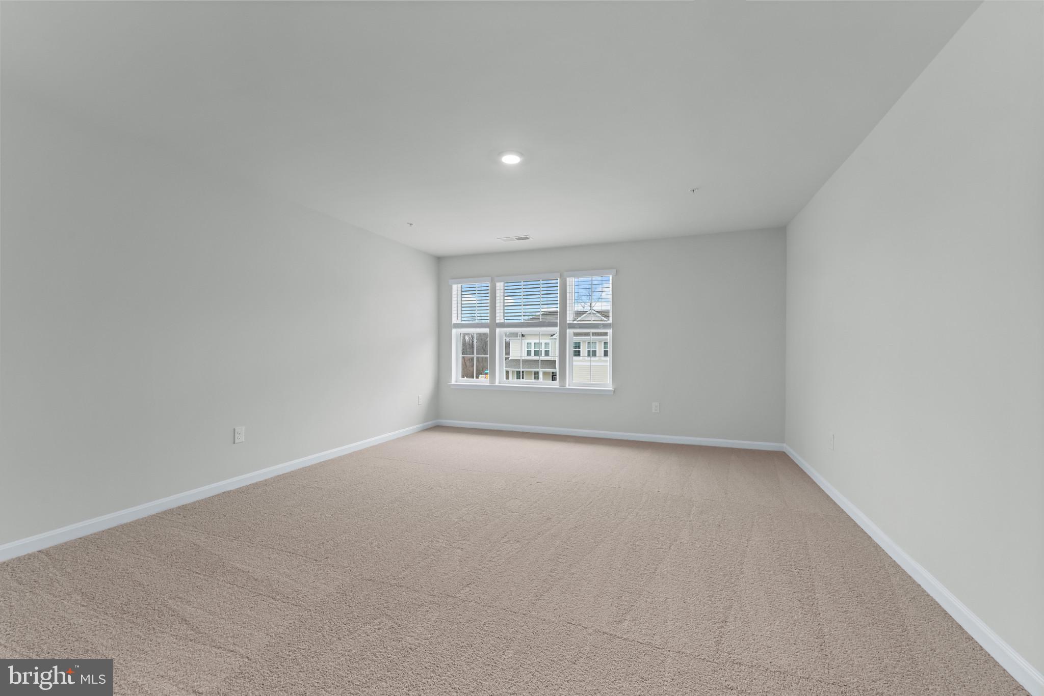 1204 Otter Point Middle River, MD 21220 - Photo 14 of 32 an empty room with windows